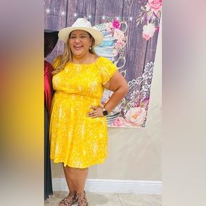 A Lovely Yellow Smocked Off Shoulder Dress